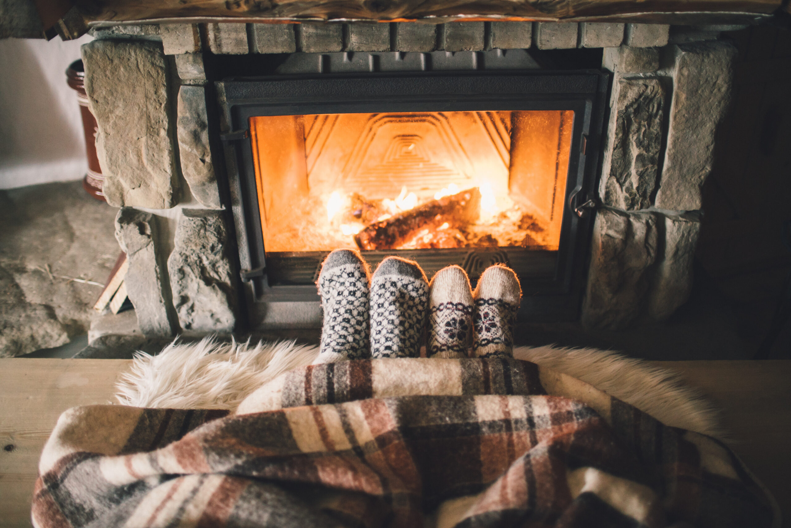 feet by fireplace